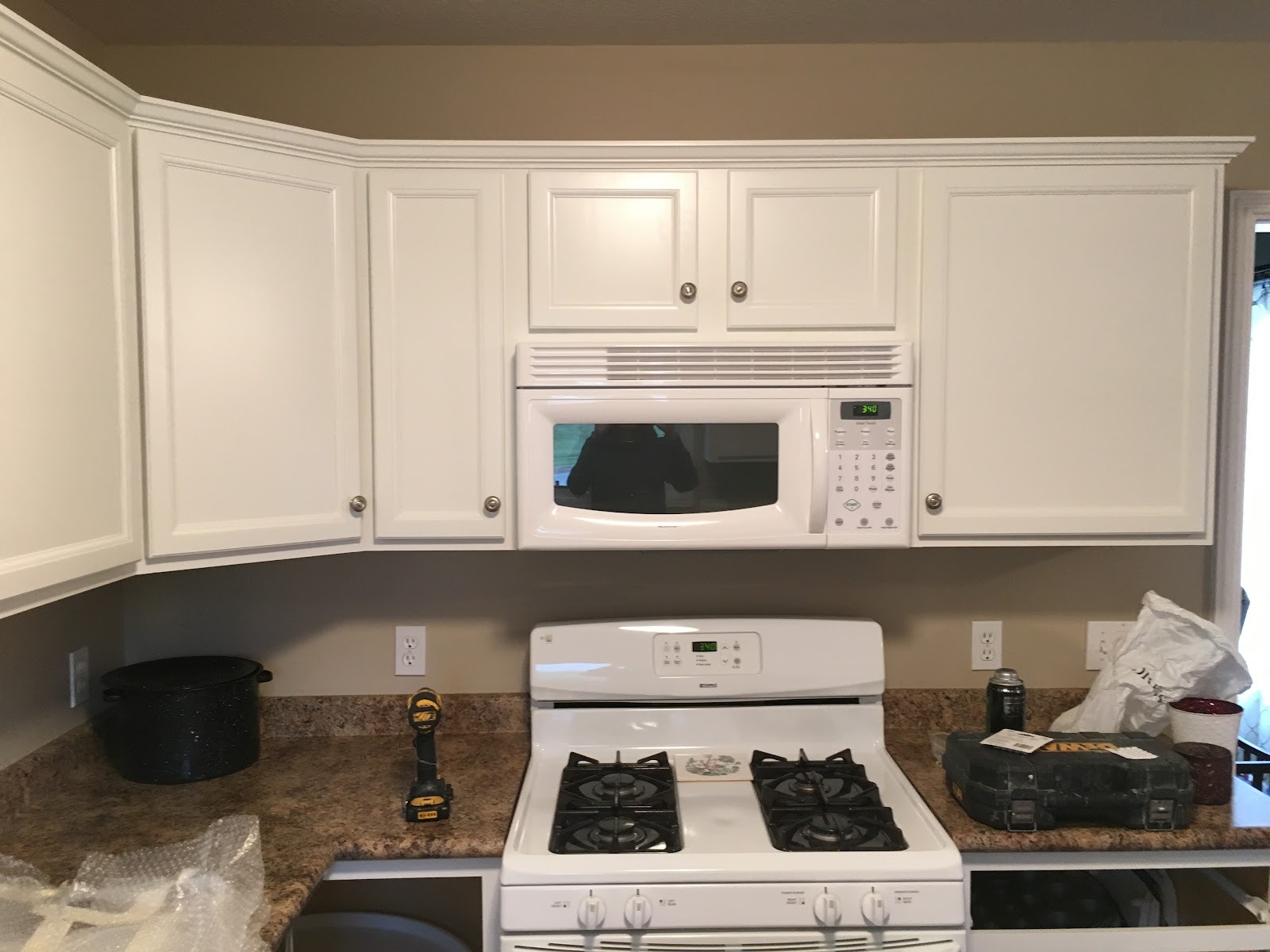 Finished white kitchen cabinets in a Fort Wayne home