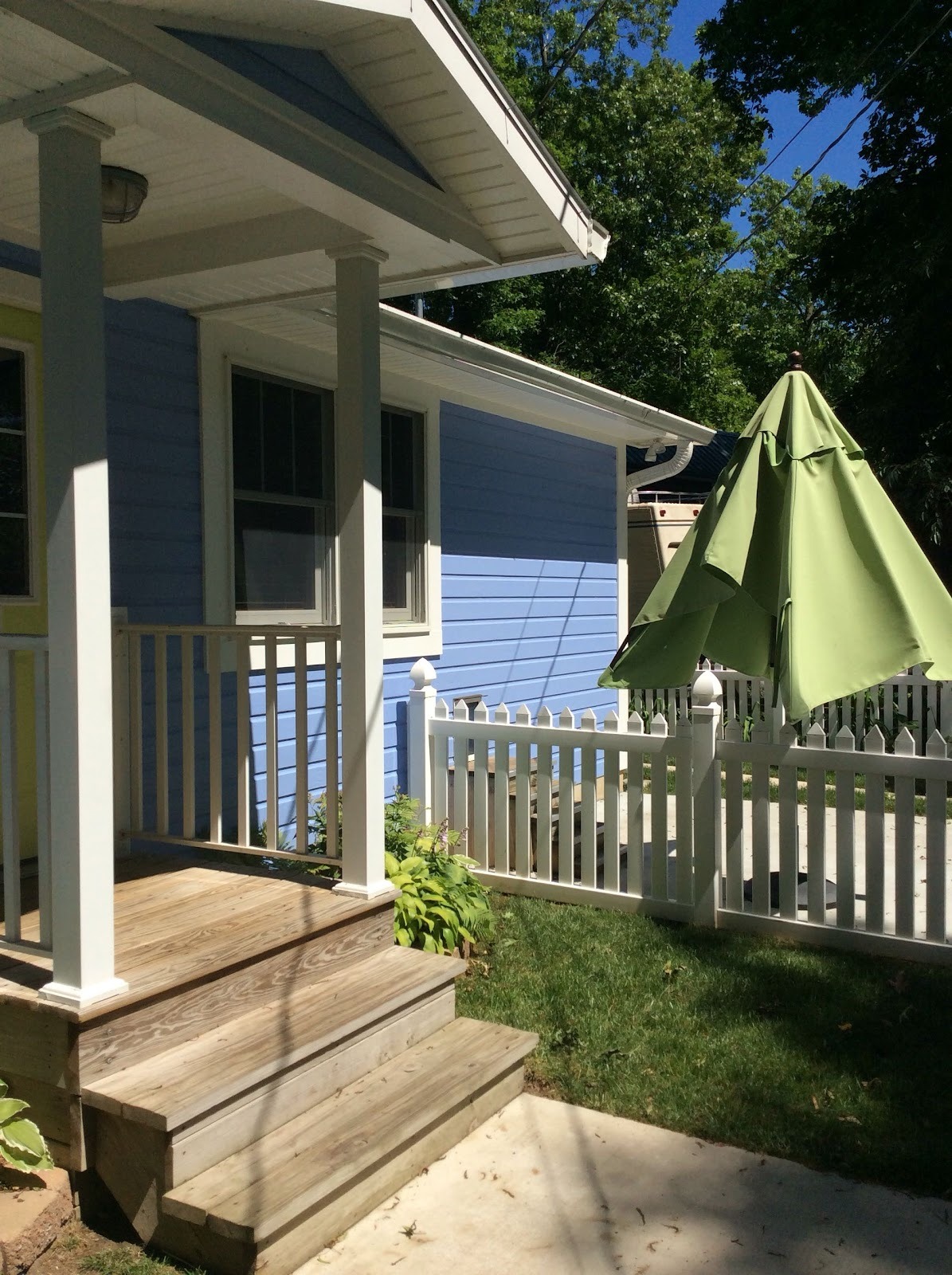 Porch columns and railings repainted white